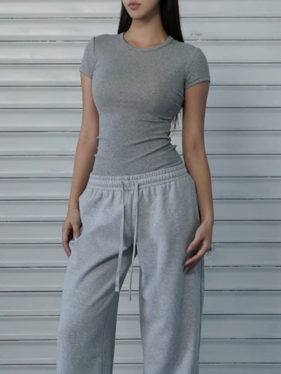 Пятно американский спорт с короткими рукавами на плече